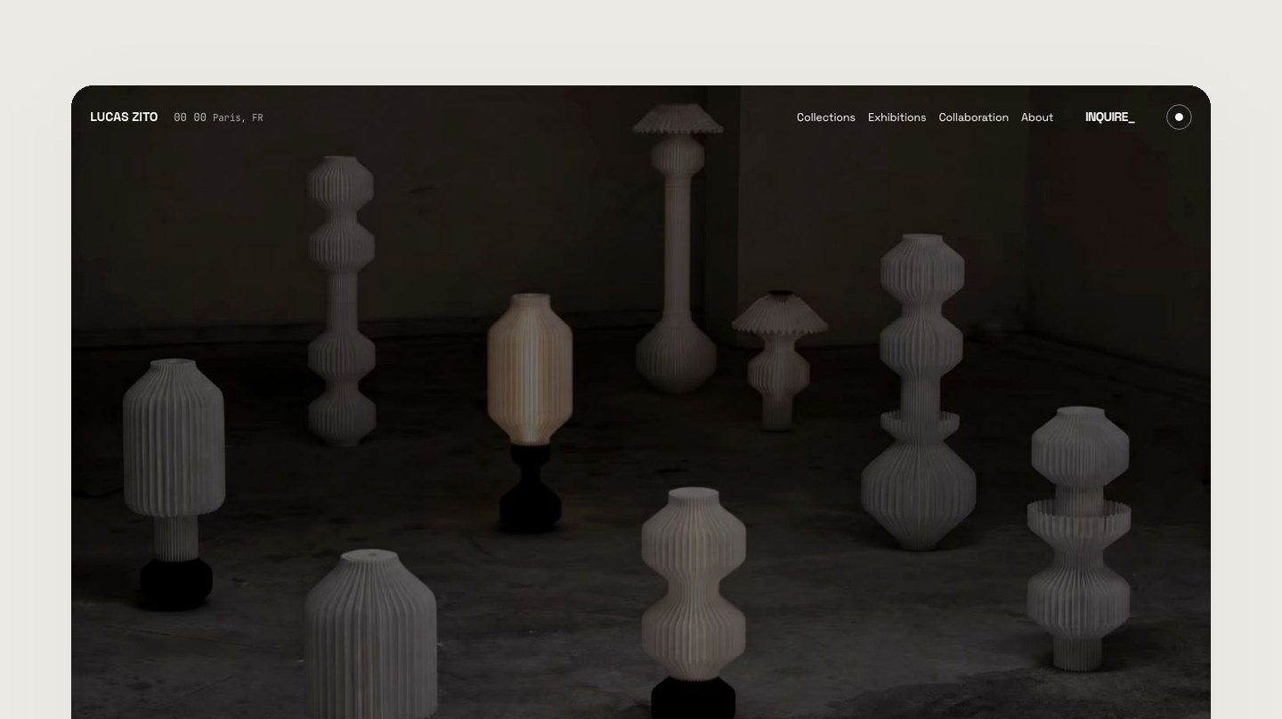 The Lucas Zito site with a lamp lit, framed on paper